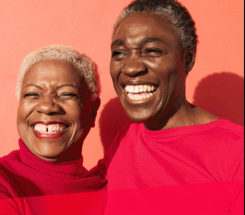 Two smiling people featured in the original Stamford Health homepage design
